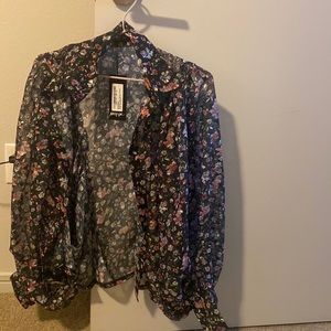 Button down floral blouse.